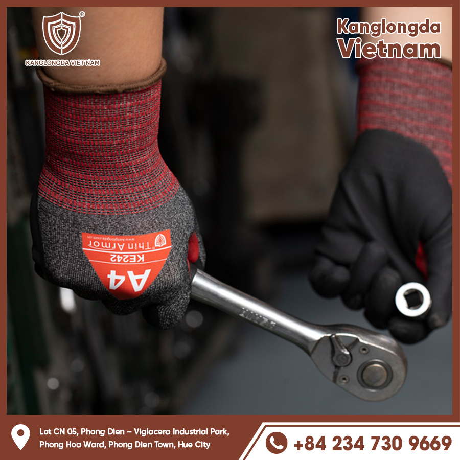 Two hands wearing gloves are working with a professional wrench tool